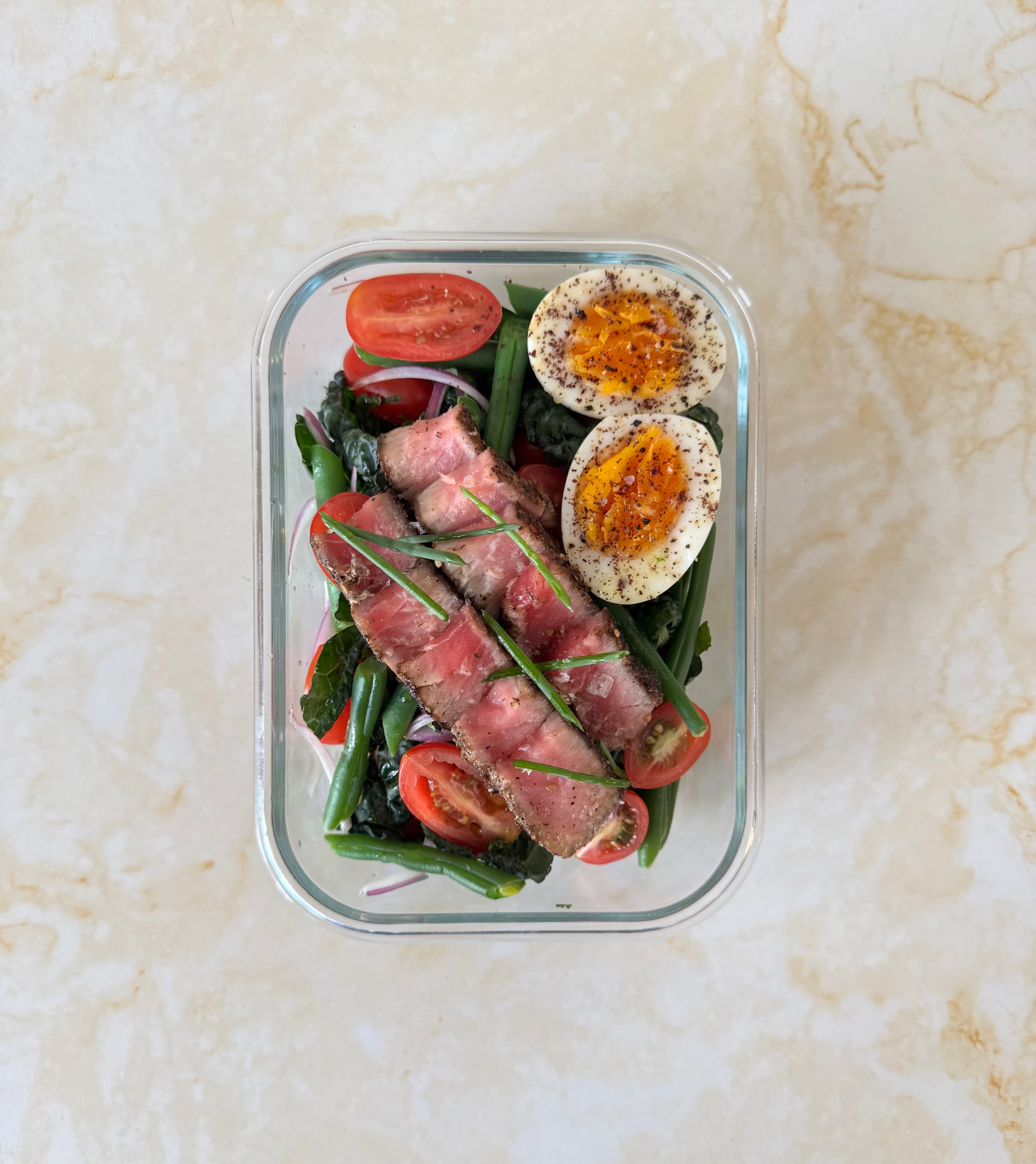 Seared tuna niçoise with soft-boiled egg, tomatoes, and green beans